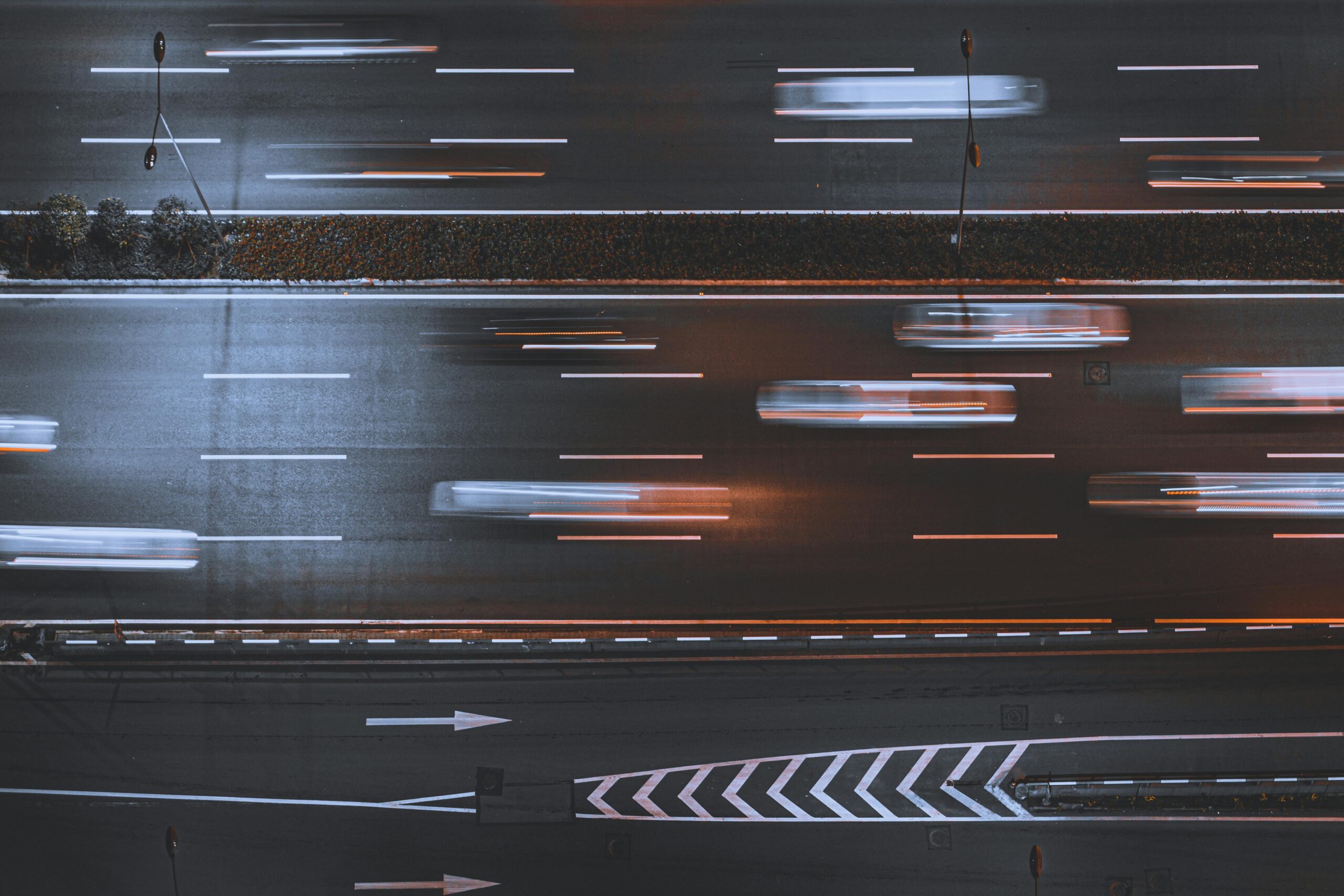 Aerial view of cars speeding on a highway